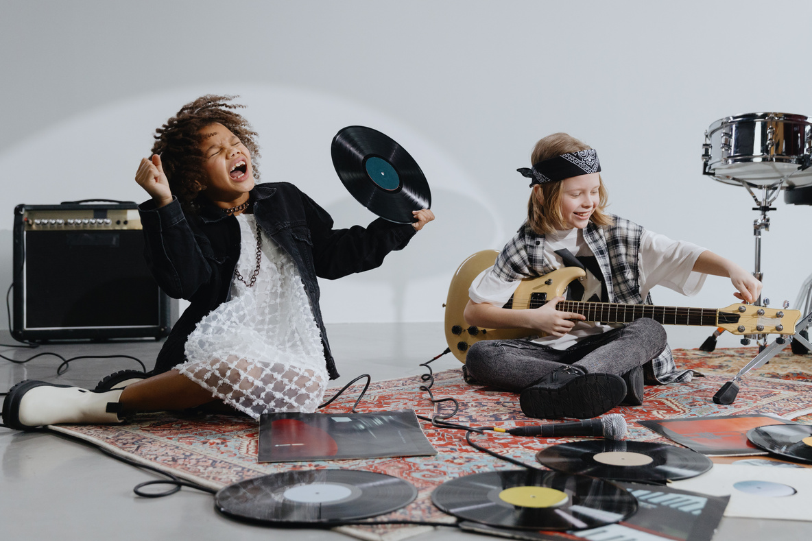 Children holding Music Instruments 
